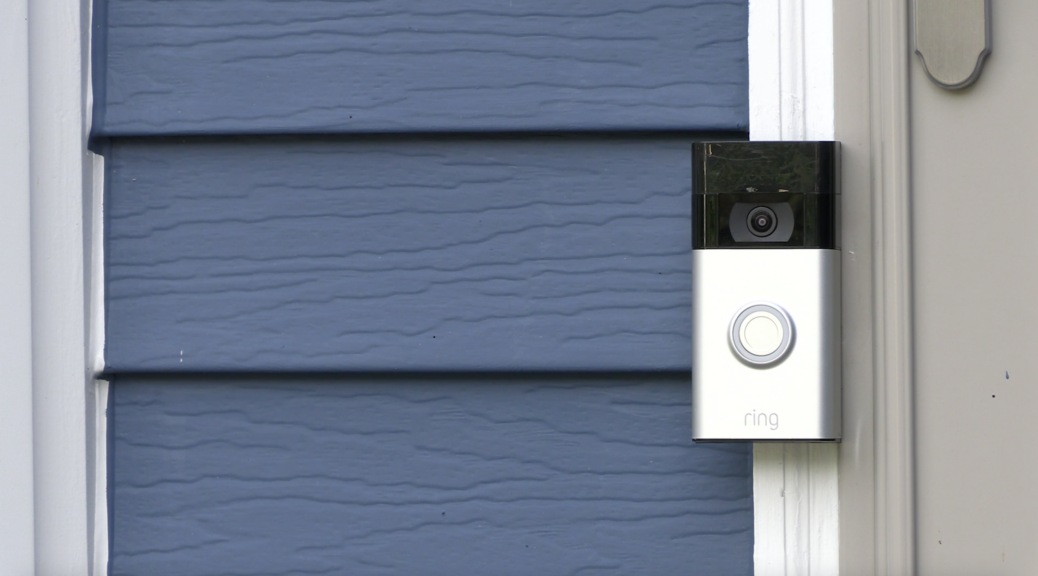 Ring doorbell on blue house